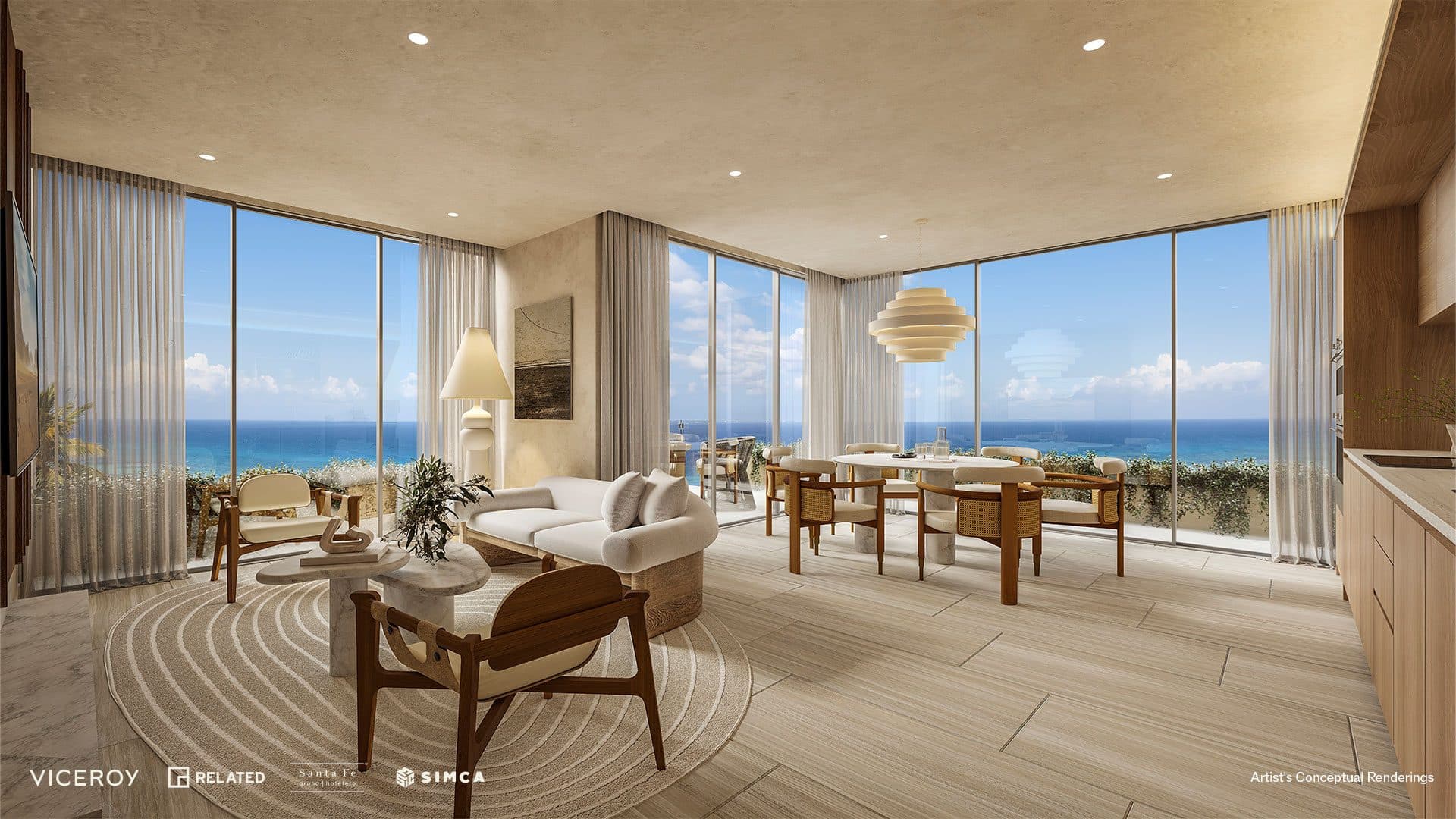 Corner living room with wraparound glass over the Caribbean.